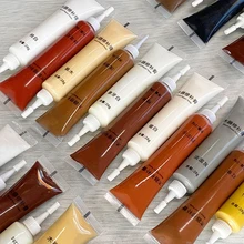 משחת תיקון עץ - מילוי סדקים וצביעה לרצפה